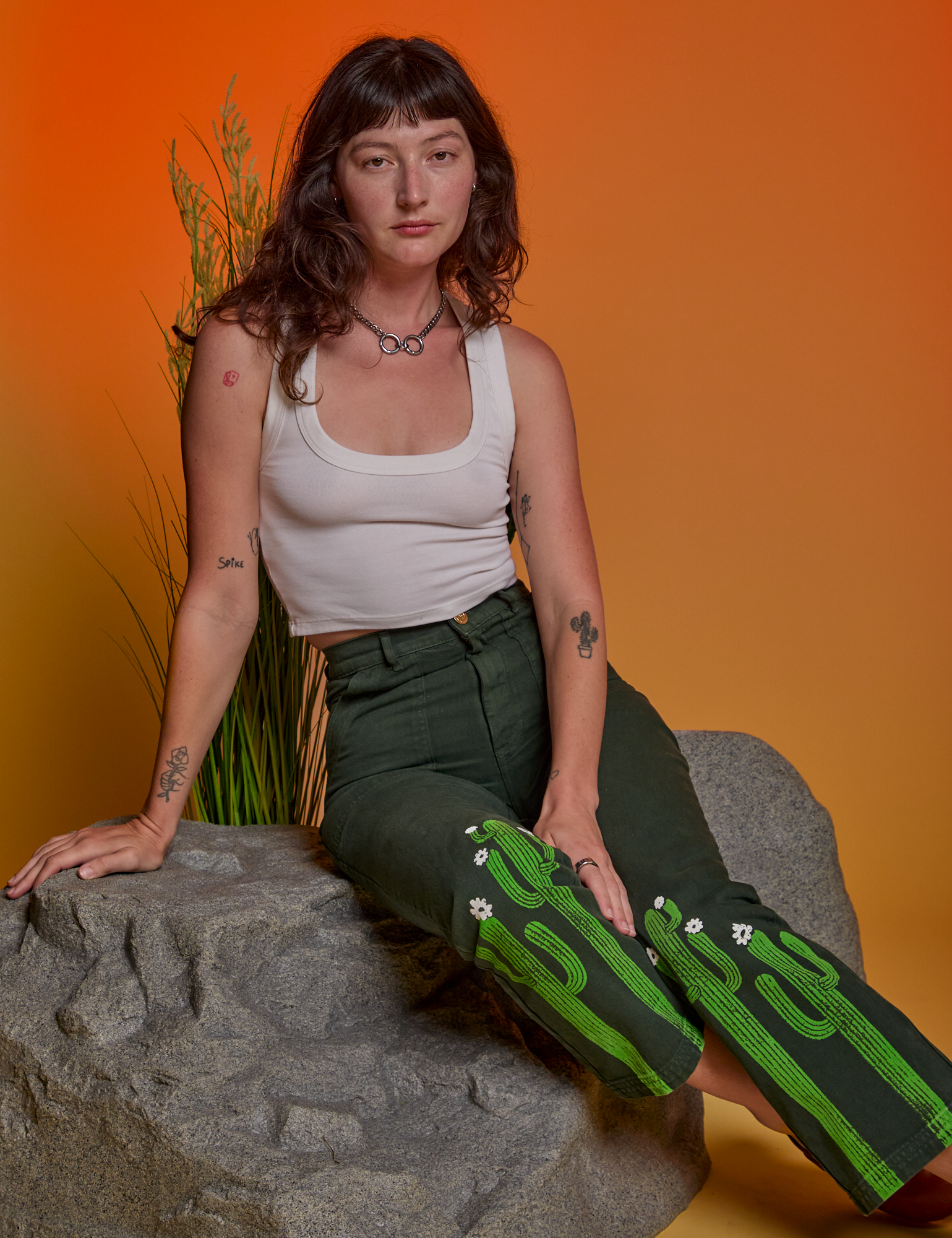 Paintstamped Work Pants in Cactus and Cropped Tank in Vintage Tee White on Alex