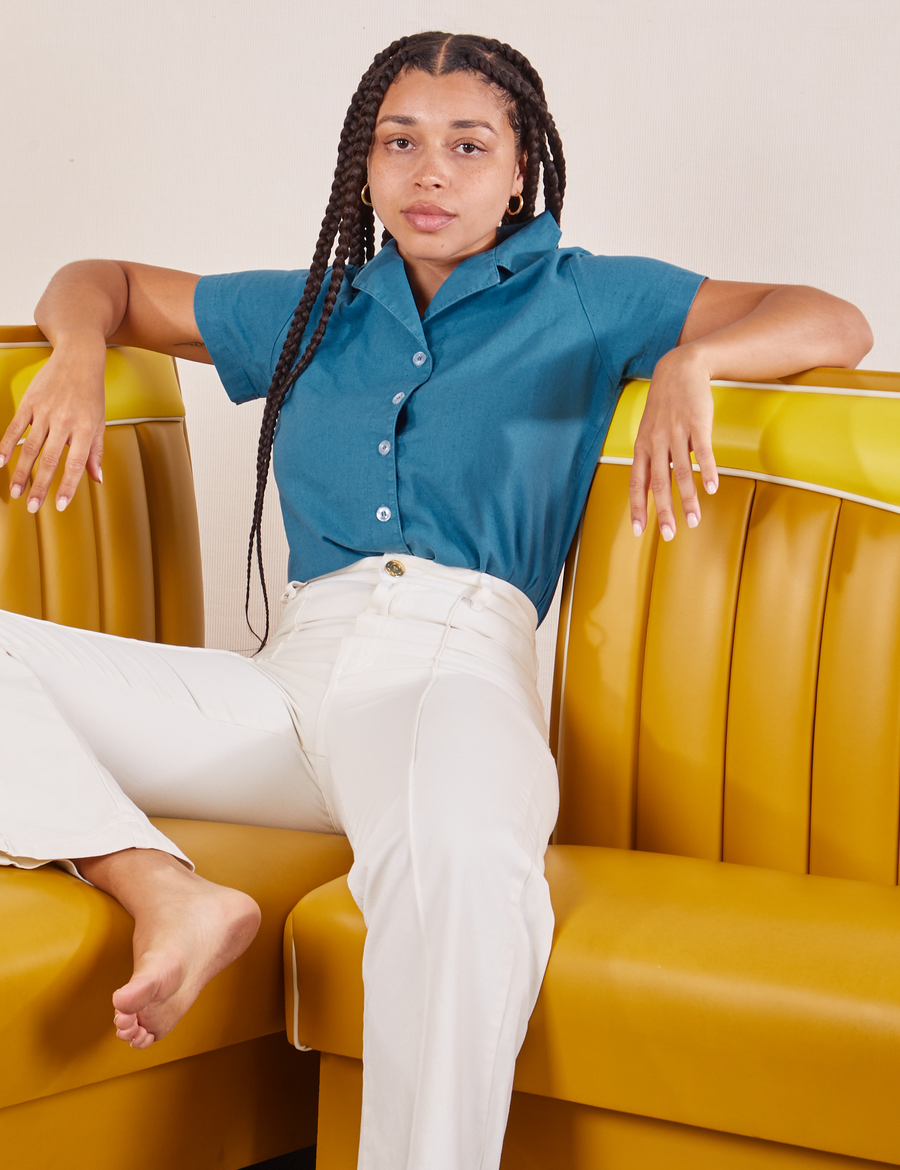 Gabi is wearing Pantry Button-Up in Marine Blue and vintage off-white Western Pants