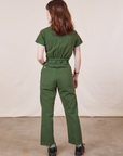 Petite Short Sleeve Jumpsuit in Dark Emerald Green back view on Hana