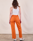 Back view of Work Pants in Construction Orange and Cropped Tank in Vintage Tee Off-White on Alex