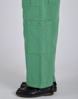 Close up side view of Drop Pocket Cargo Pants in Seafoam Green pant leg on Isaac