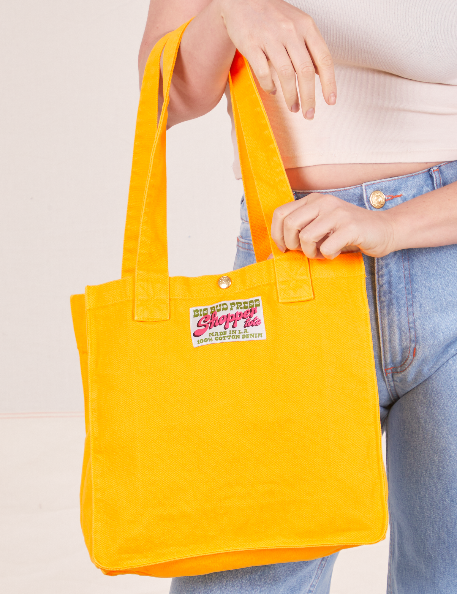 Shopper Tote Bag in Sunshine Yellow worn on arm of Allison