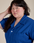 Angled front view close up of Short Sleeve Jumpsuit in Royal Blue on Ashley