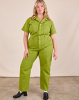 Lish is 5'8" and wearing L Short Sleeve Jumpsuit in Gross Green