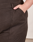 Front pocket close up of Short Sleeve Jumpsuit in Espresso Brown  worn by Marielena