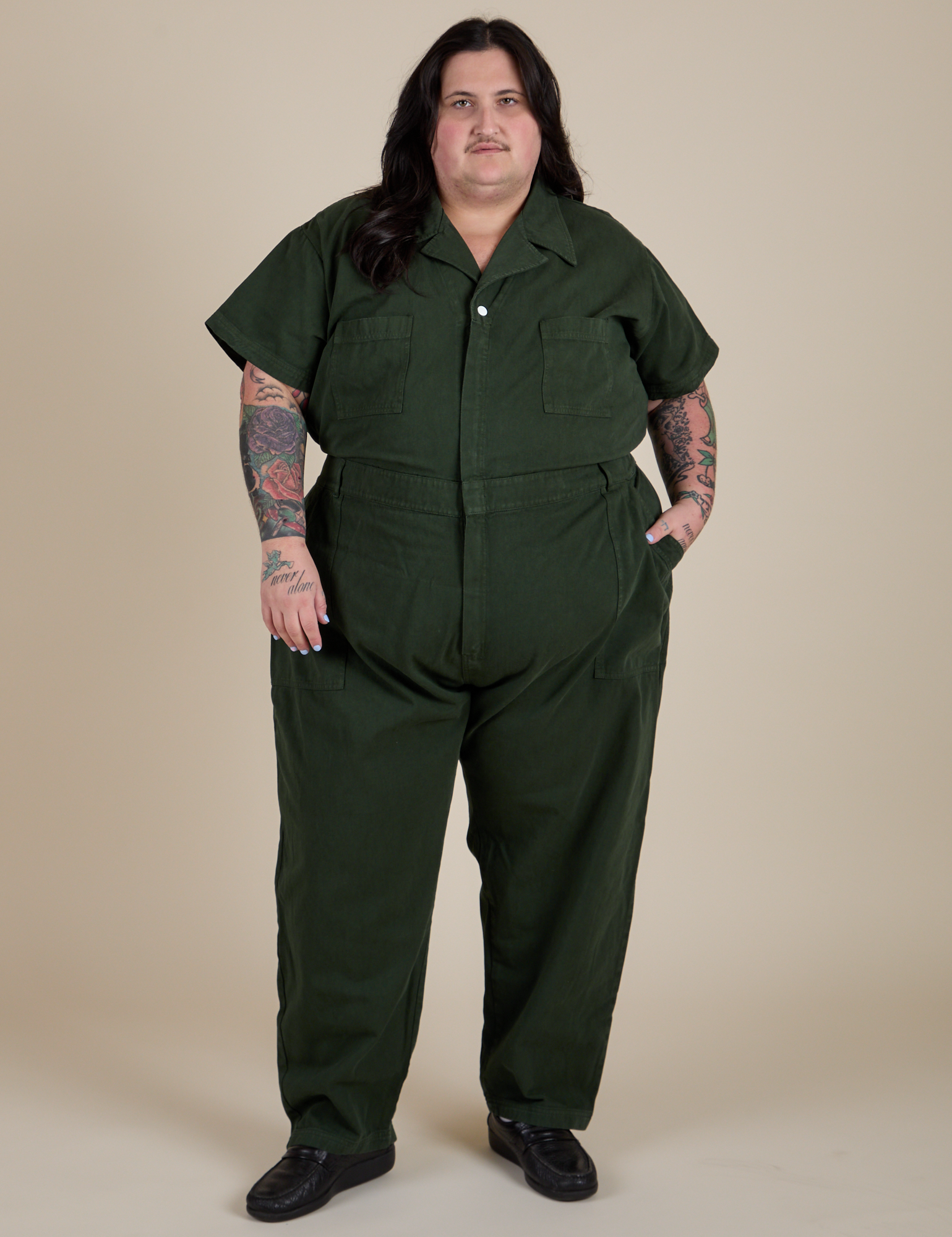Sam is 5'10" and wearing 4XL Short Sleeve Jumpsuit in Swamp Green