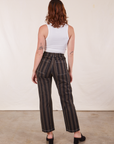 Back view of Black Striped Work Pants in Espresso and vintage off-white Cropped Tank Top on Alex