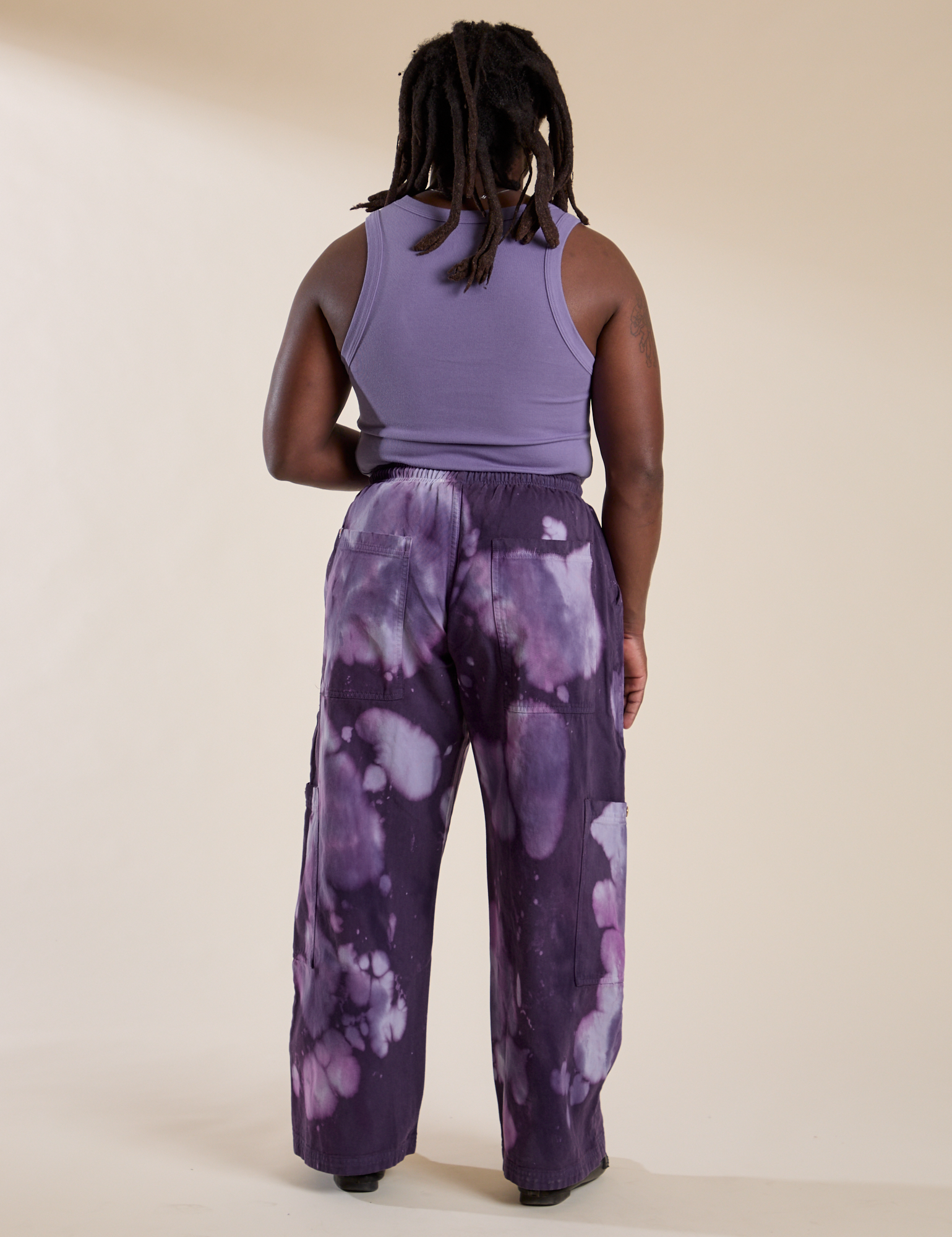Back view of Magic Waters Drop Pocket Pants in Dark Lavender and faded grape Cropped Tank on Demi
