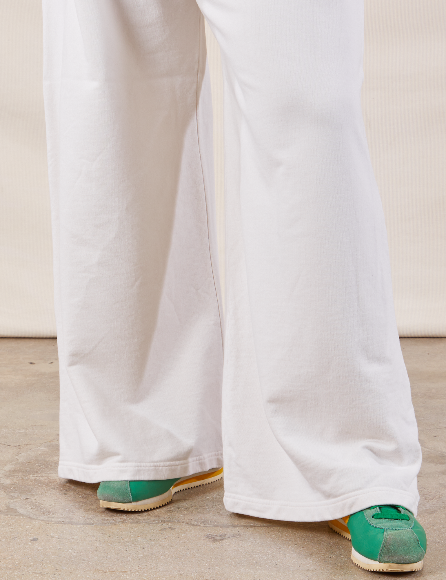 Wide Leg Sweat Pants in Vintage Tee Off-White pant leg close up on Ryan