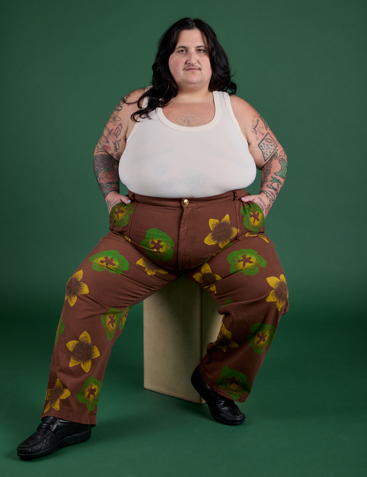 Floral Painted Work Pants in Brown and Tank Top in Vintage Tee Off-White worn by Sam