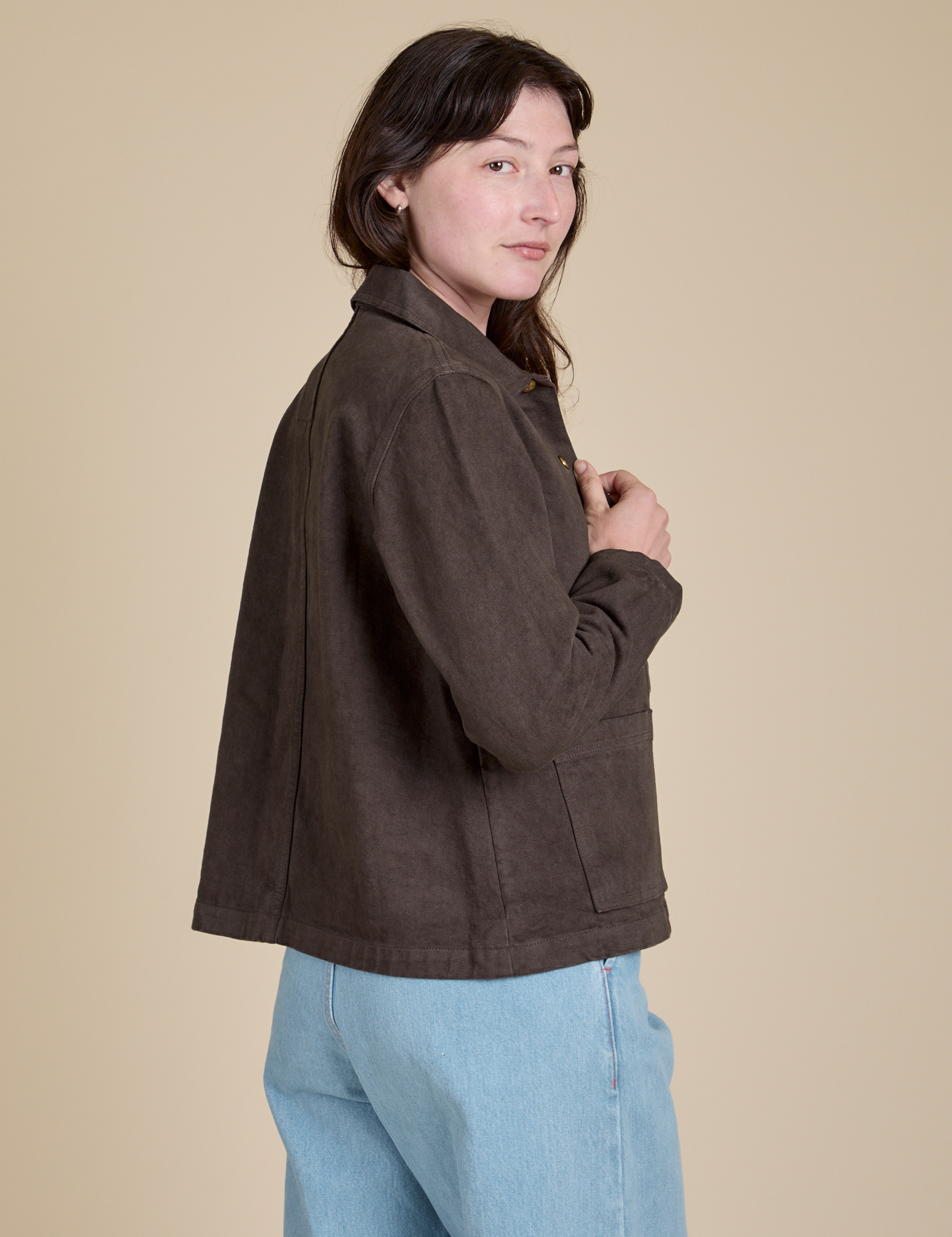Angled back view of Denim Work Jacket in Espresso Brown on Alex