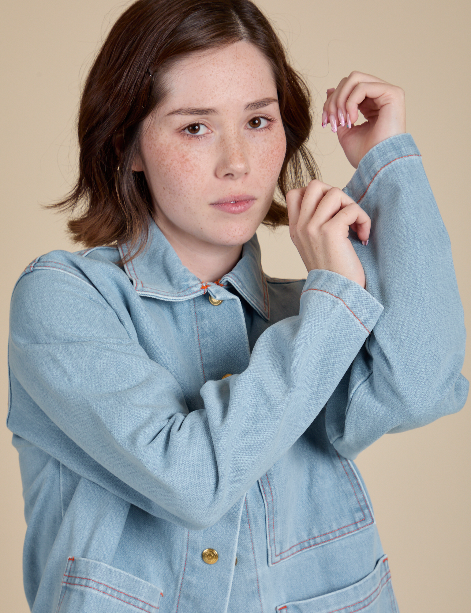 Indigo Denim Work Jacket in Light Wash close up on Hana