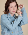 Indigo Denim Work Jacket in Light Wash close up on Hana