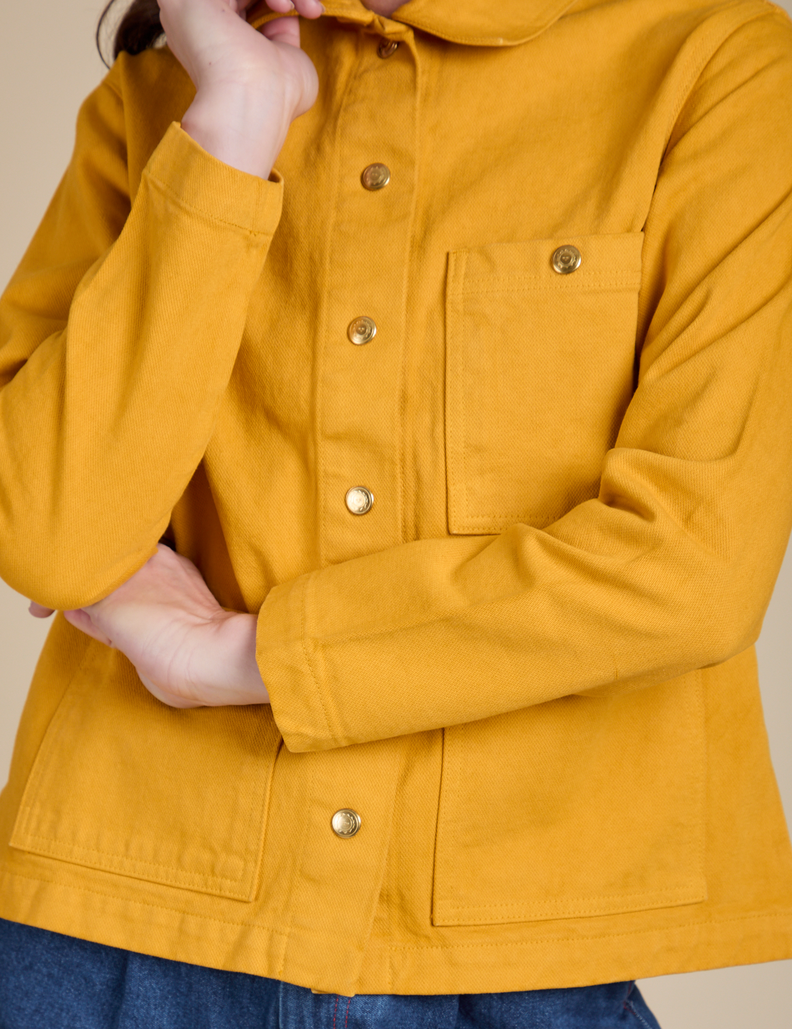 Denim Work Jacket in Mustard Yellow front close up on Alex