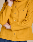 Denim Work Jacket in Mustard Yellow front close up on Alex