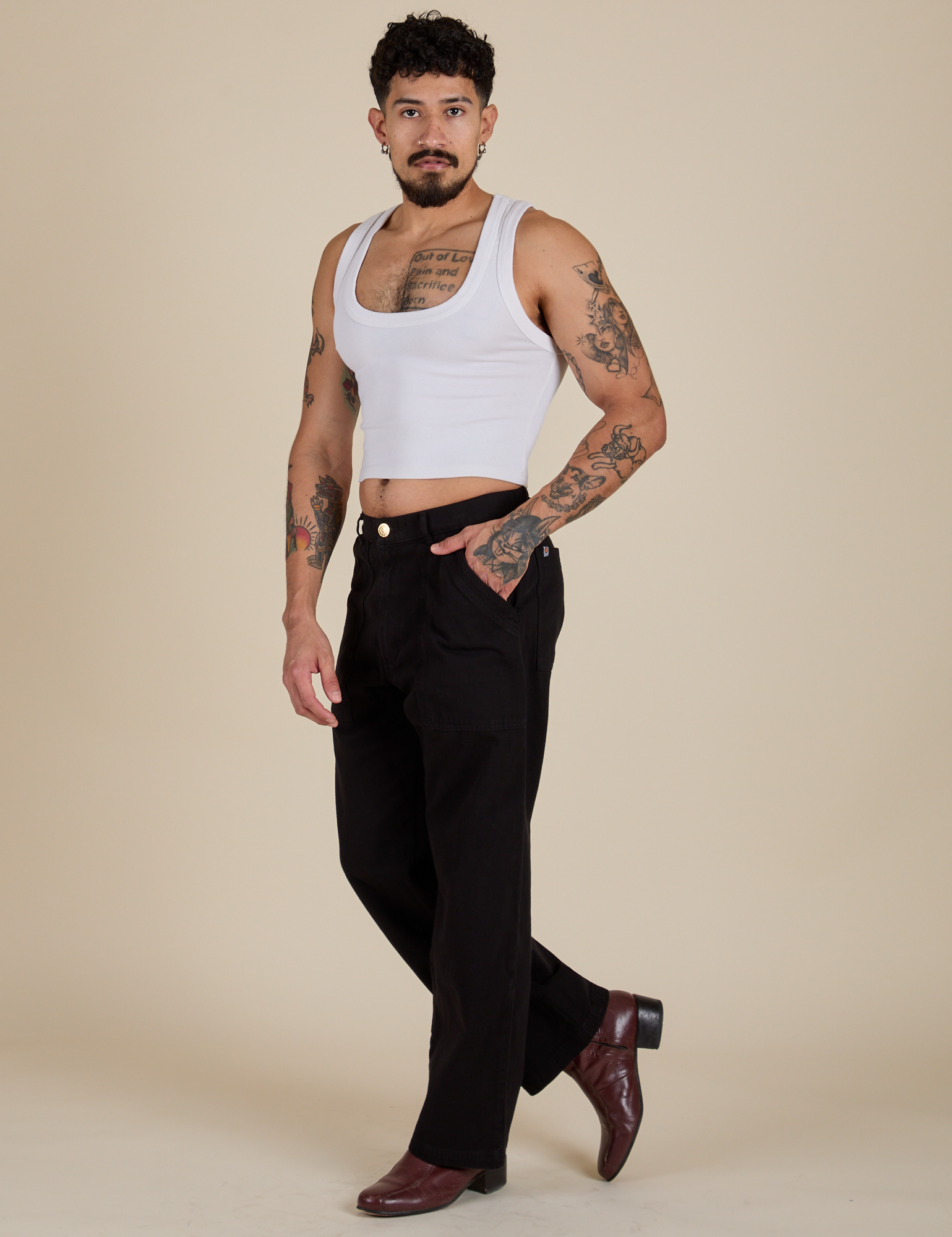 Angled front view of Work Pants in Basic Black and vintage tee white Cropped Tank