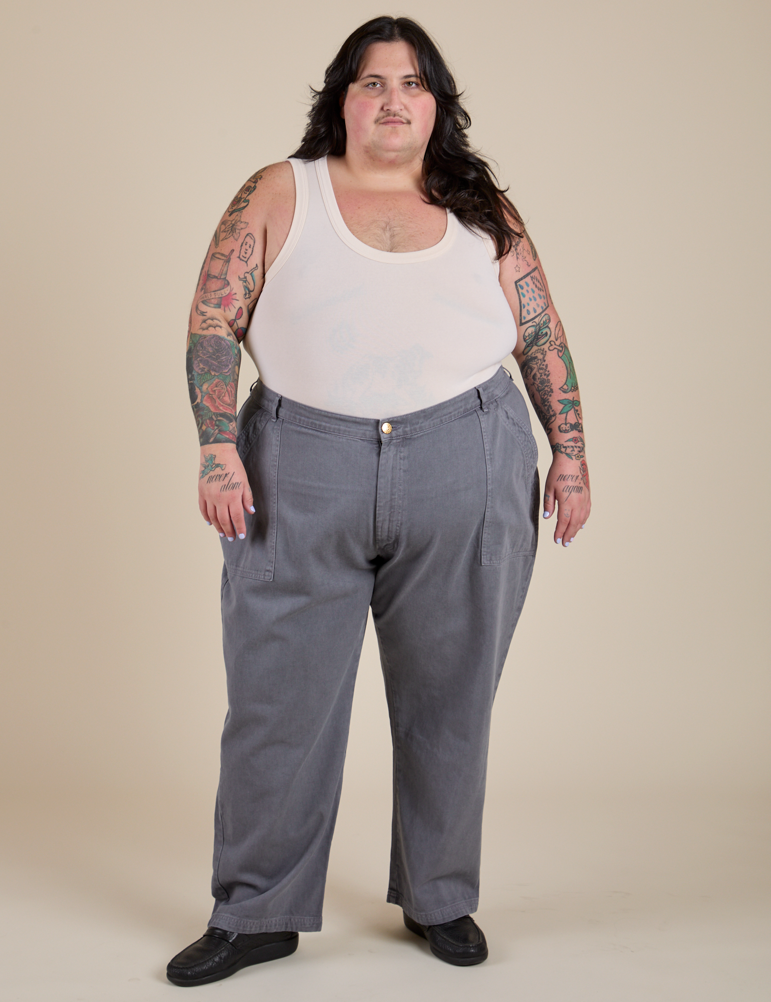 Sam is 5’10” and wearing 4XL Work Pants in Washed Grey paired with Tank Top in Vintage Tee Off-White