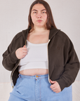 Marielena is 5'8" and wearing L Cropped Zip Hoodie in Espresso Brown with a vintage off-white Cropped Tank underneath