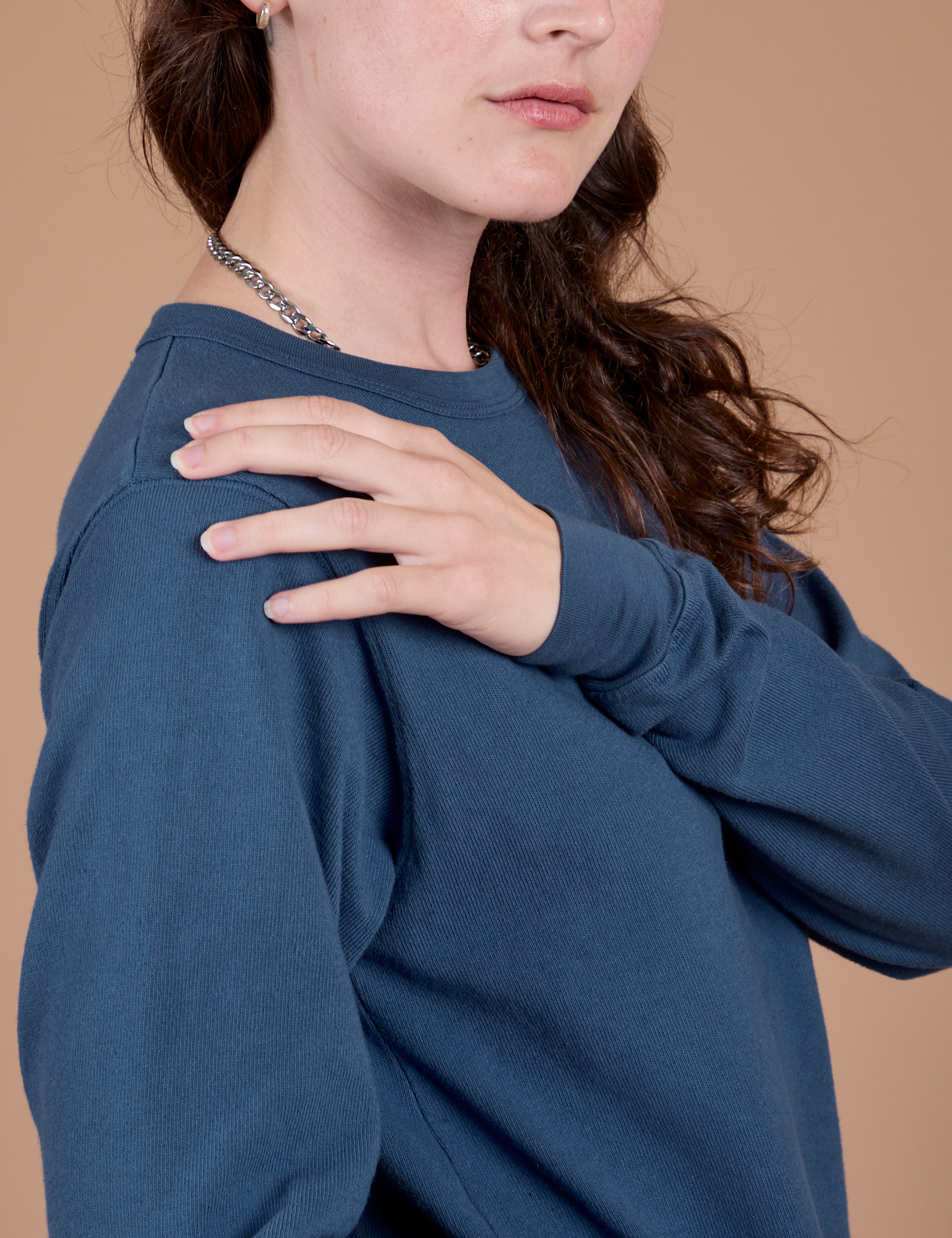 Long Sleeve Burly Tee in French Blue side shoulder close up on Alex