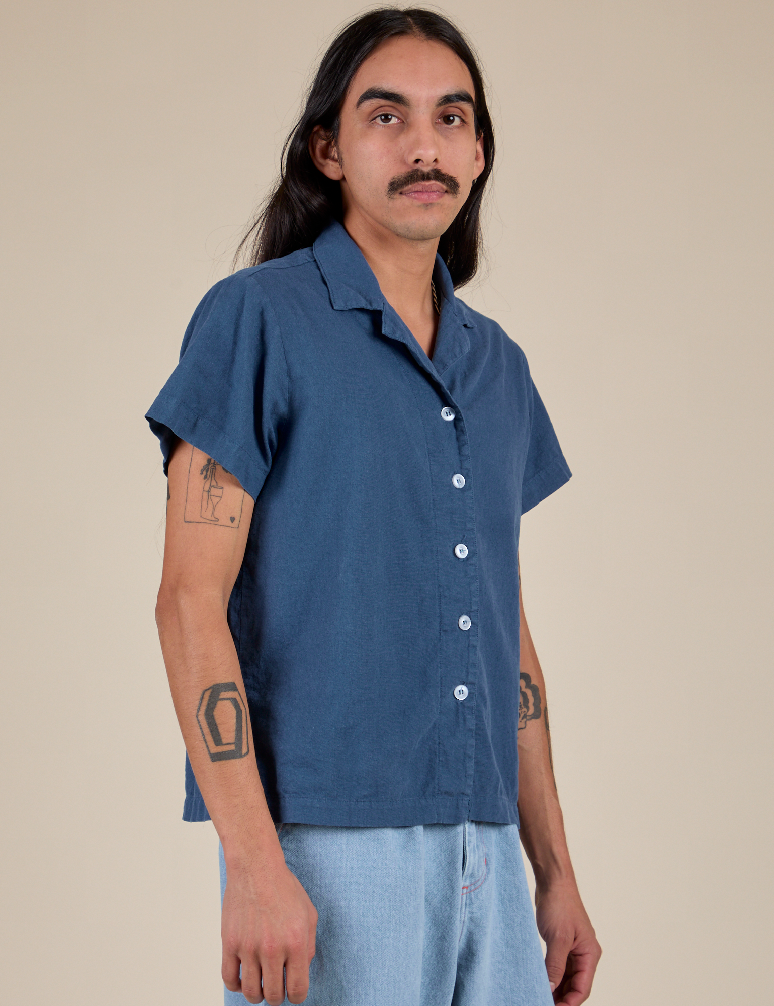 Angled front view of Pantry Button-Up in French Blue on Anthony