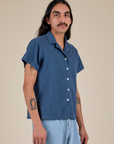 Angled front view of Pantry Button-Up in French Blue on Anthony