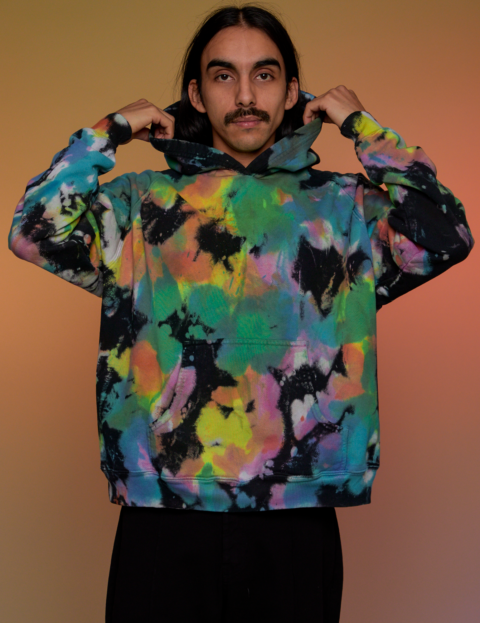 Oversized Hoodie in Rainbow Magic Waters worn by Anthony