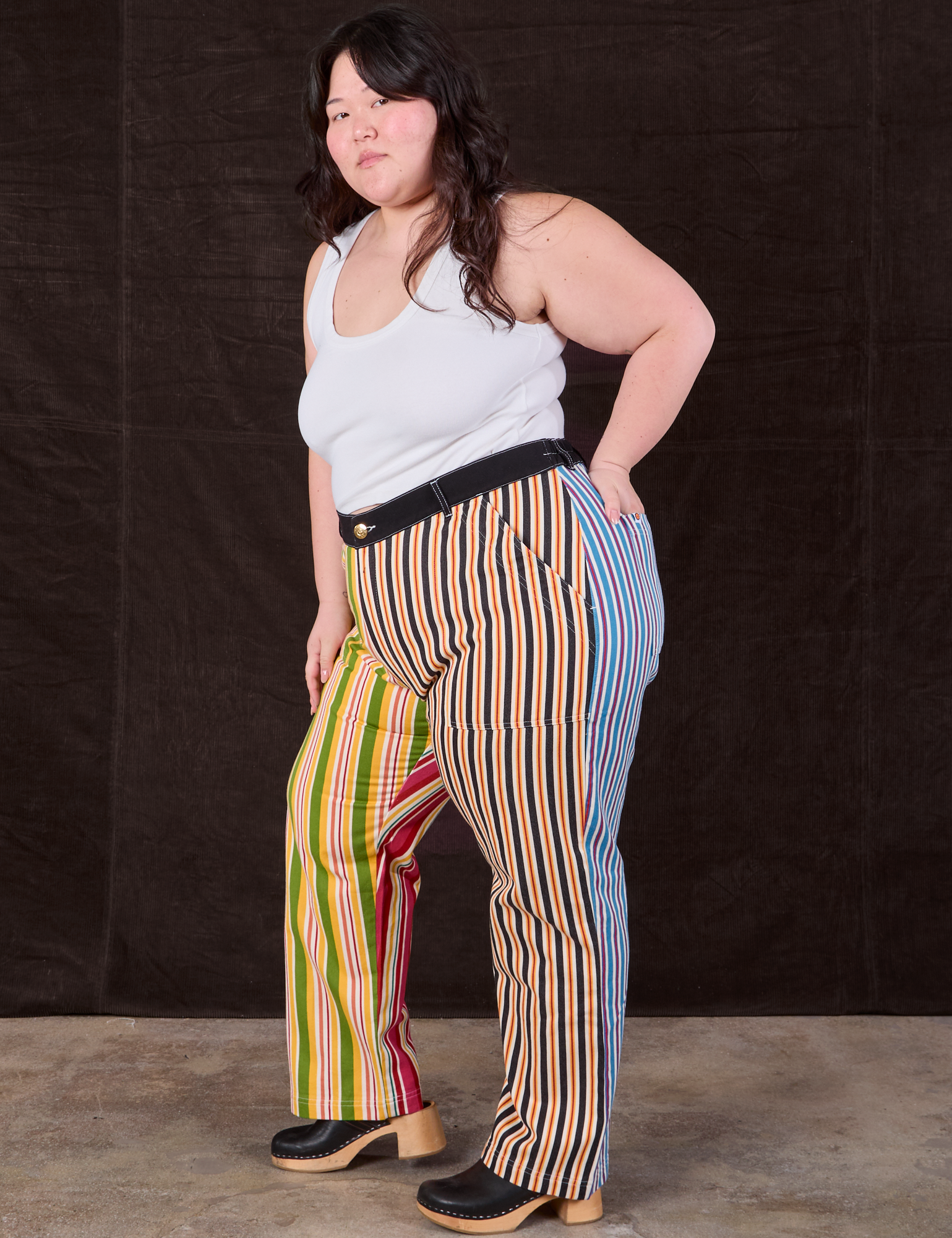 Side view of Mixed Stripe Work Pants and Tank Top in vintage tee off-white