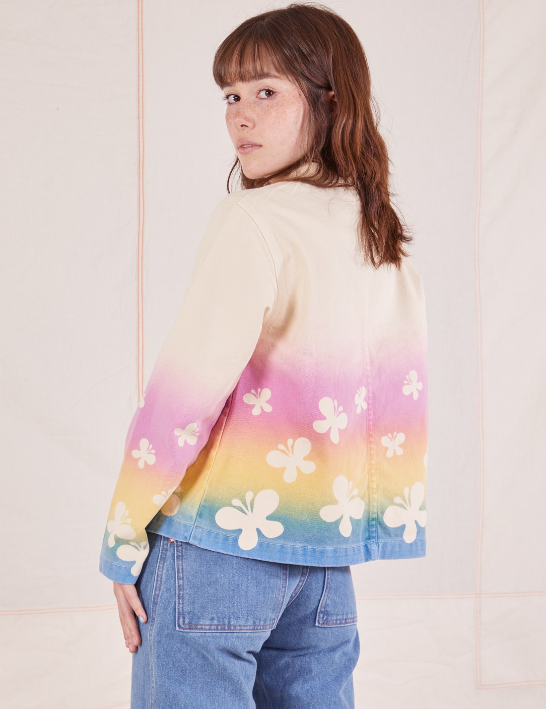 Angled back view of Work Jacket in Butterfly Airbrush on Hana