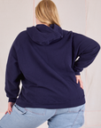 Collegiate Hoodie in Navy Blue back view on Juliet