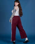 Painted Action Pants in Red Wine angled back view on Sydney