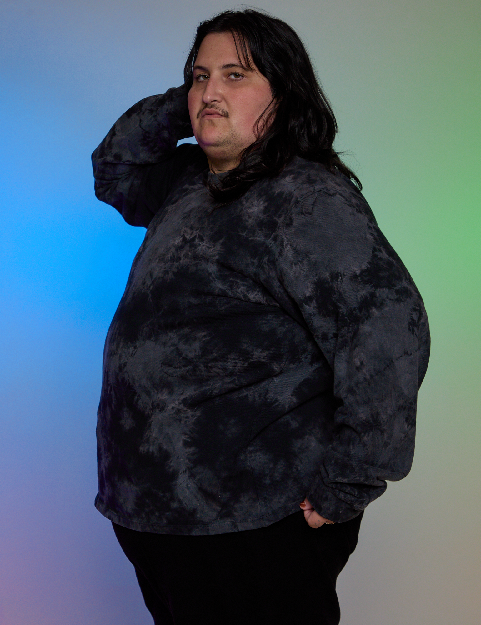 Side view of Magic Waters Long Sleeve Burly Tee in Black on Sam