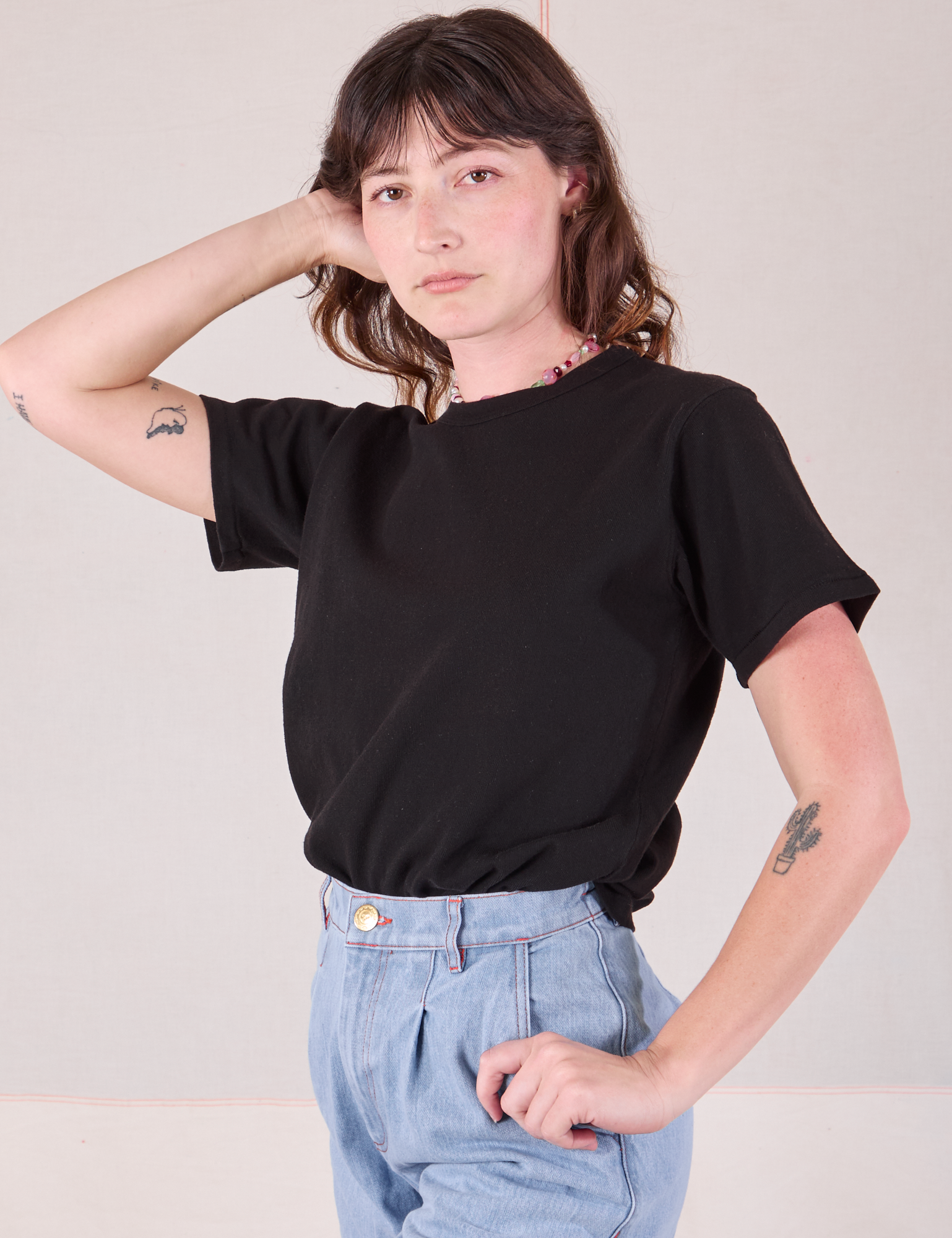 Burly Tee in Basic Black angled front view on Alex