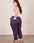 Angled back view of Petite Work Pants in Nebula Purple worn by Ashley