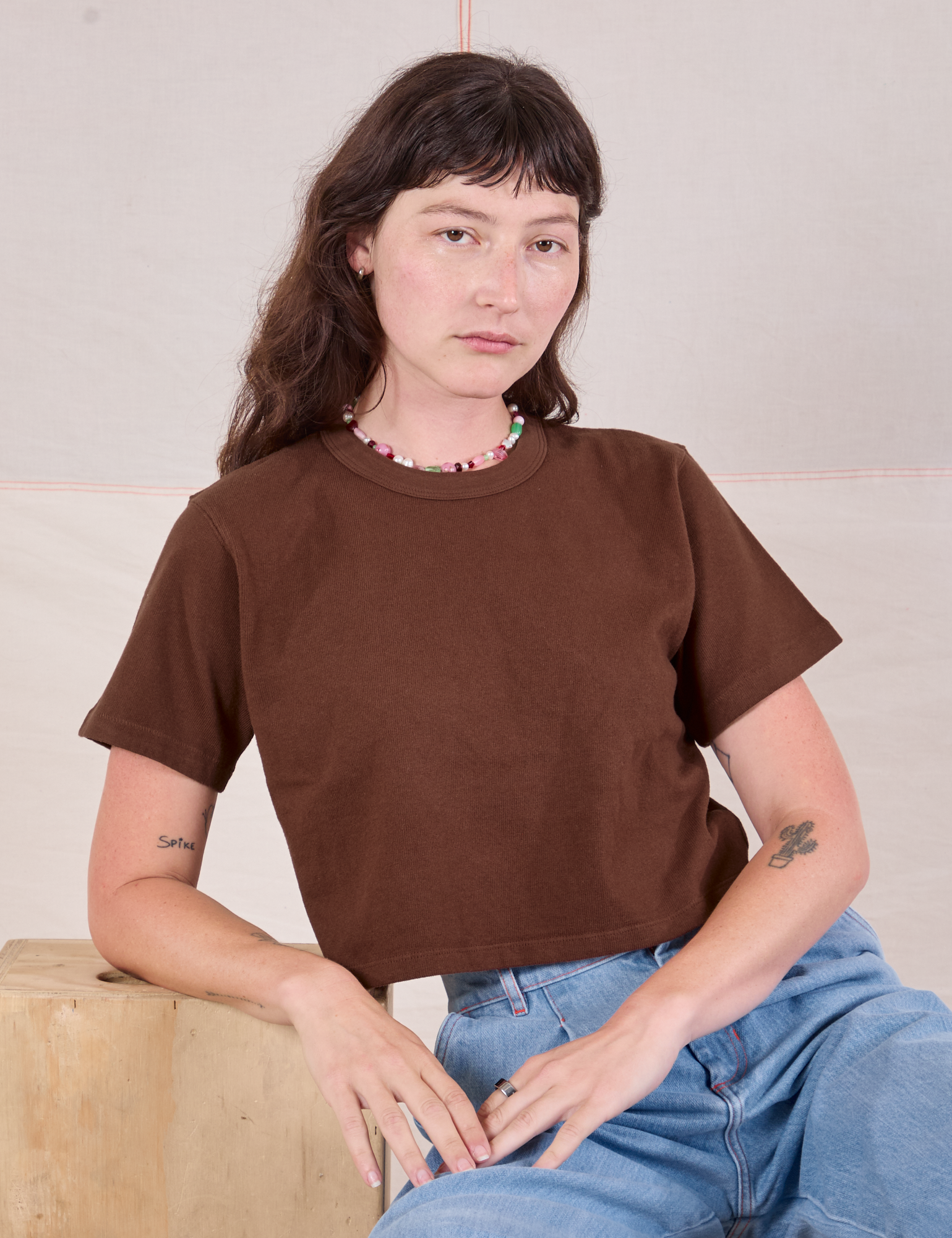 Cropped Burly Tee in Fudgesicle Brown worn by Alex