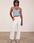 Jerrod is Halter Top in Periwinkle and vintage off-white Western Pants