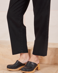 Side view pant leg close up of Heavyweight Trousers in Basic Black on Alex.