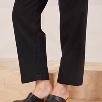 Side view pant leg close up of Heavyweight Trousers in Basic Black on Alex.