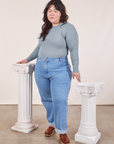 Ashley is wearing Honeycomb Thermal in Periwinkle and light wash Frontier Jeans