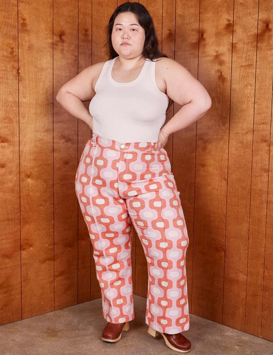 Ashley is wearing Western Pants in Pink Jacquard