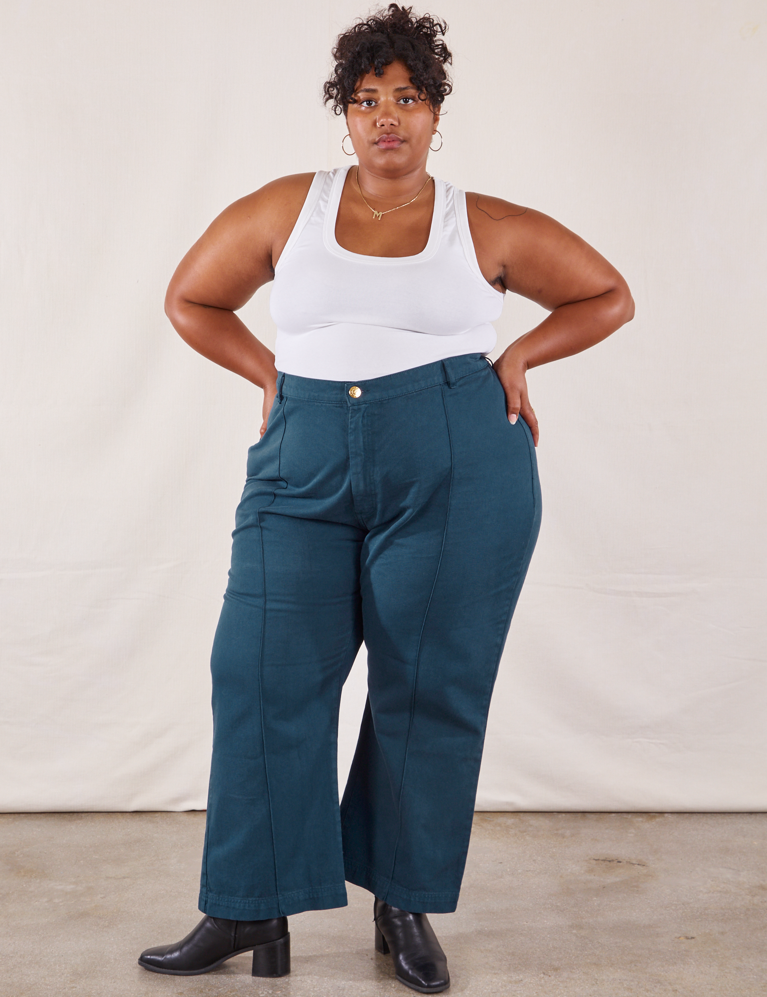 Morgan is 5&#39;5&quot; and wearing 2XL Western Pants in Lagoon paired with vintage tee off-white Tank Top