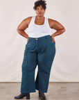 Morgan is 5'5" and wearing 2XL Western Pants in Lagoon paired with vintage tee off-white Tank Top