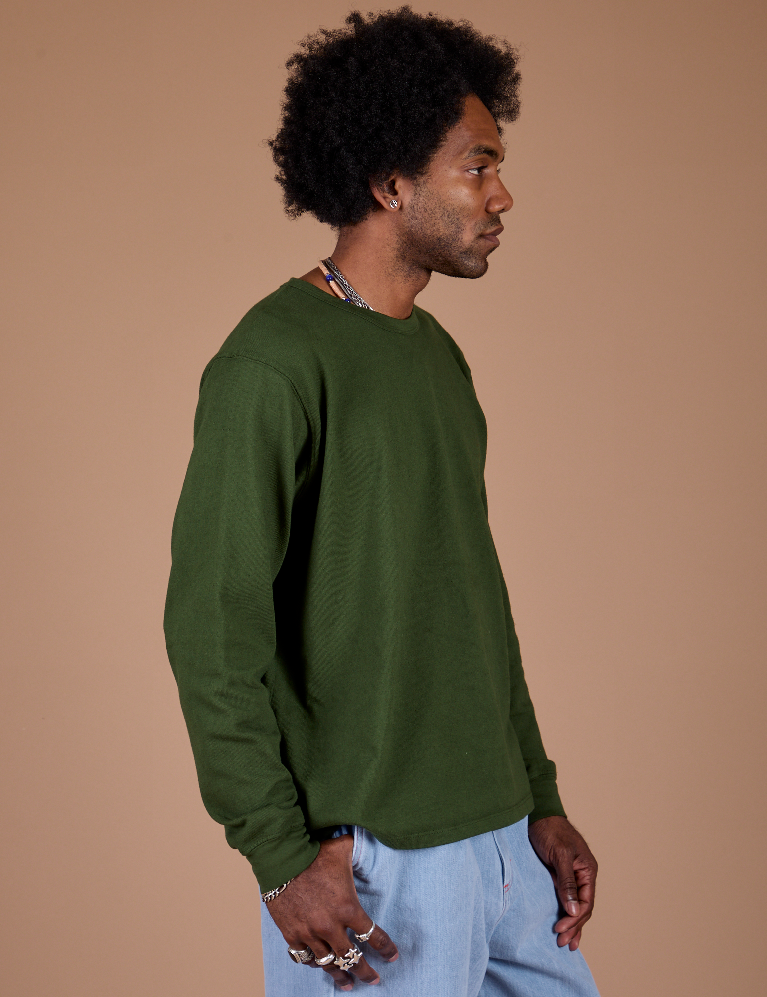 Long Sleeve Burly Tee in Evergreen side view on Jerrod