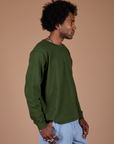 Long Sleeve Burly Tee in Evergreen side view on Jerrod