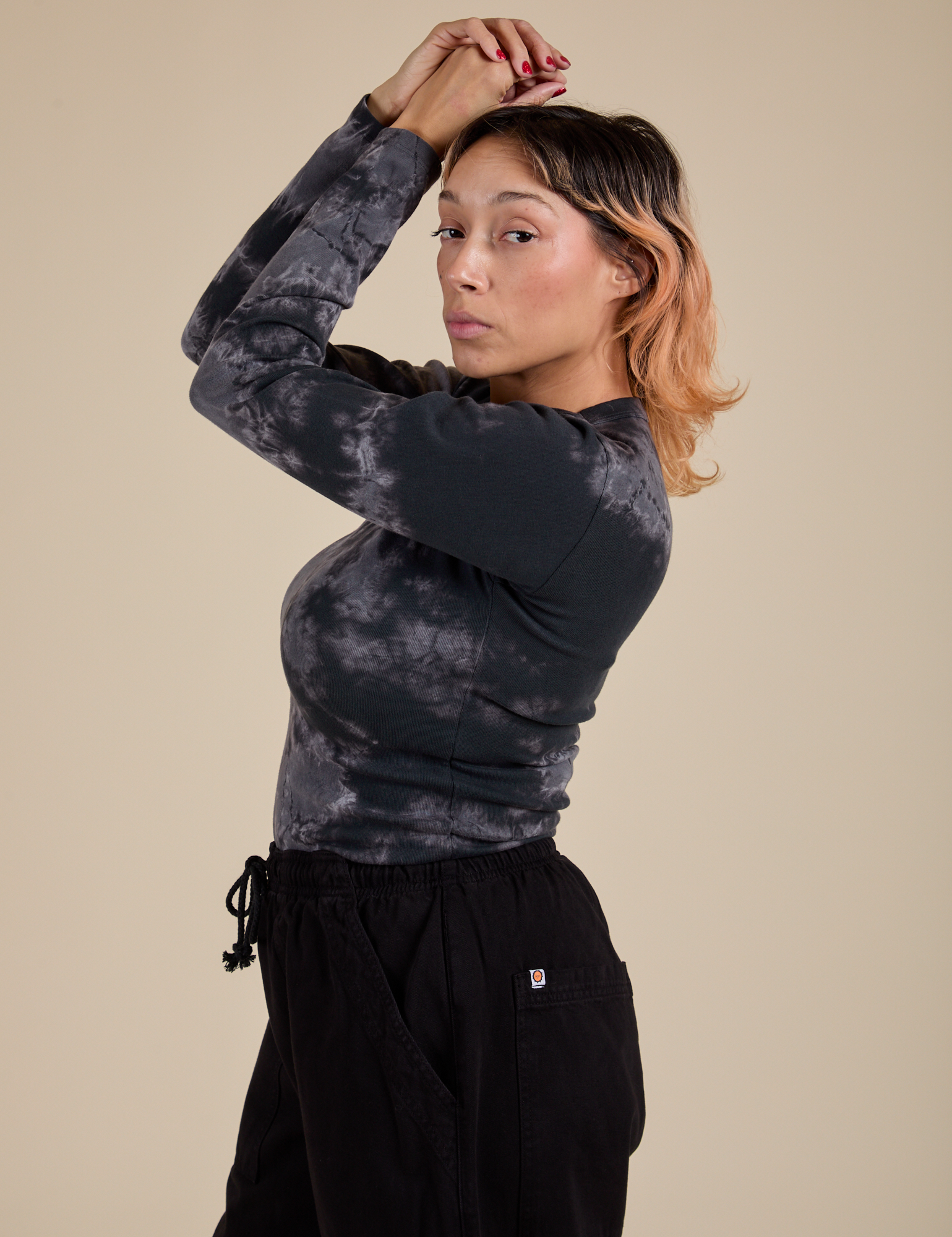 Long Sleeve Baby Tee in Black Magic Waters side view on Tiara