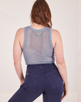 Back view of Mesh Tank Top in Periwinkle and navy Western Pants worn by Allison
