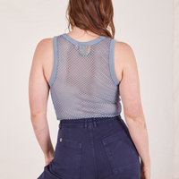 Back view of Mesh Tank Top in Periwinkle and navy Western Pants worn by Allison