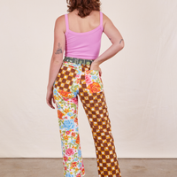 Back view of Mismatched Print Work Pants and bubblegum pink Cropped Cami worn by Alex