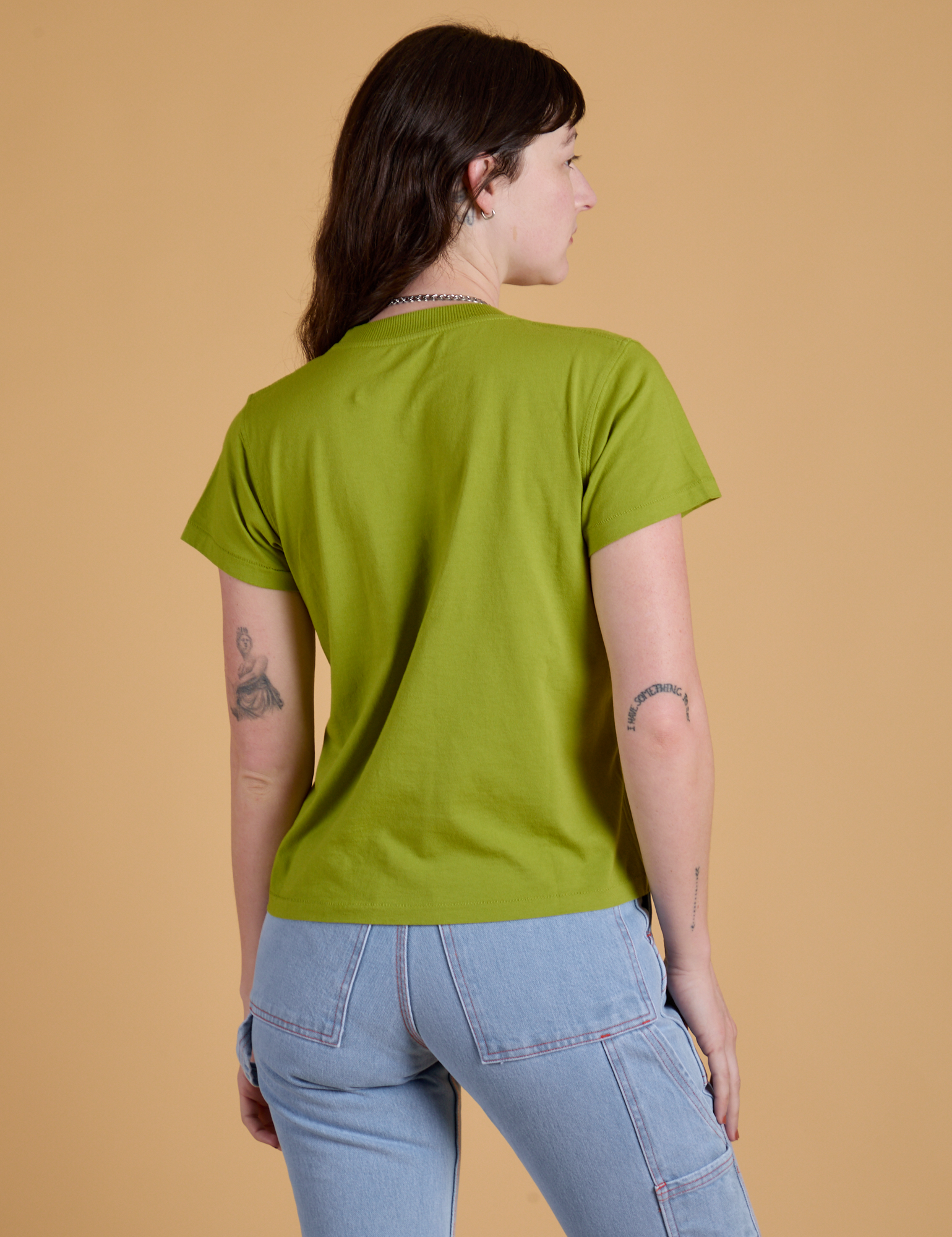 Organic Vintage Tee in Gross Green back view on Alex
