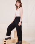Side view of Organic Trousers in Basic Black worn by Hana
