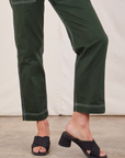 Original Overalls in Swamp Green pant leg close up on Alex